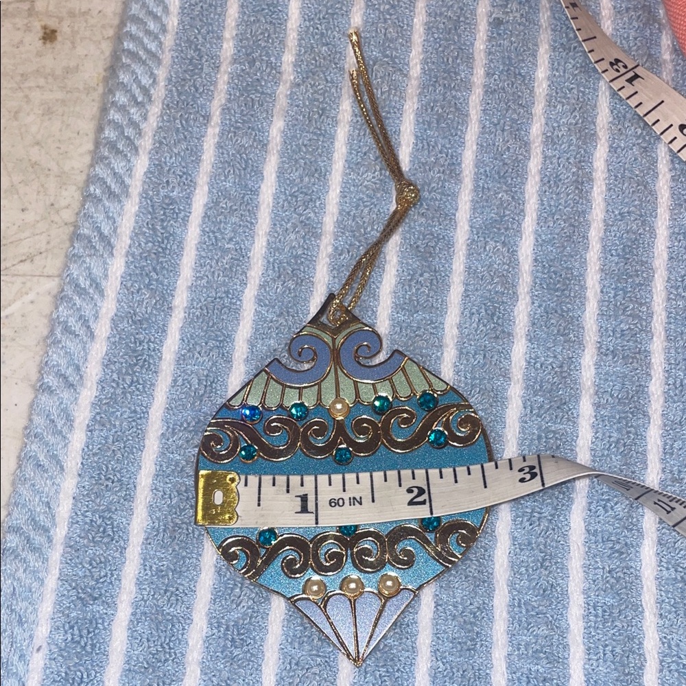 Blue and Gold Ornament with Intricate Design